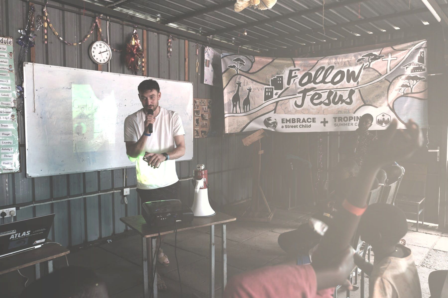 A visiting team member teaching boys during Embrace Camp in Kenya