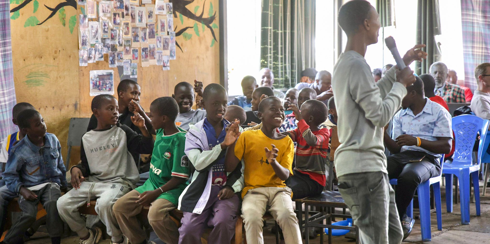 Boys participating in a gathering at the Embrace Centre