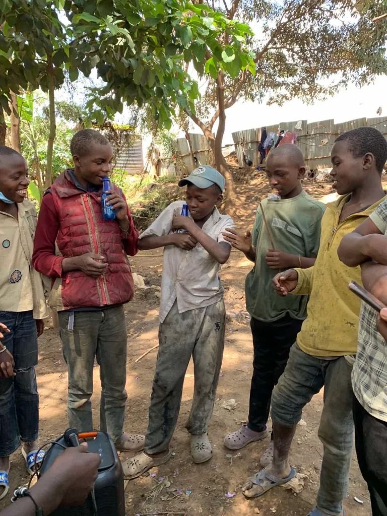 Boys living on the street before coming to Embrace